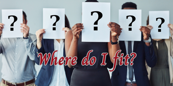 People holding question marks.